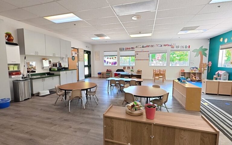 Blocks station and reading area in a Kids Inc. classroom