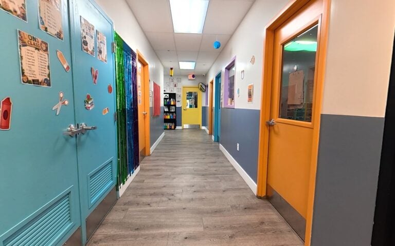 Bright, colorful hallway at Kids Inc. Preschool in Folsom