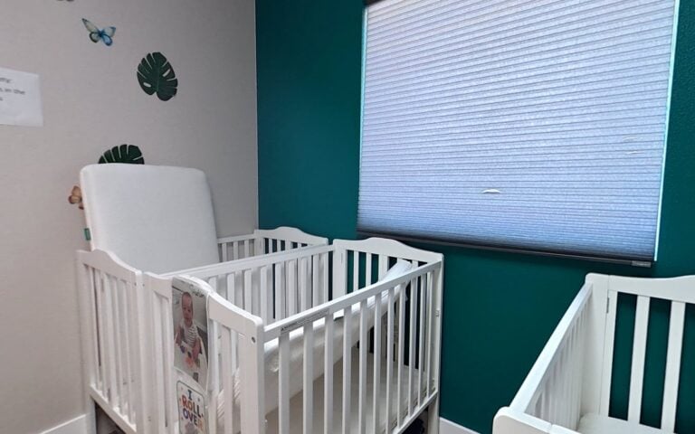 Calm infant room with cribs at Kids Inc. daycare in Folsom